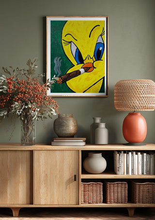 Bad Birdie by Bibi above a wooden sideboard on a sage green wall