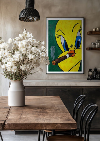 Bad Birdie by Bibi in a black frame above a rustic table with white flowers