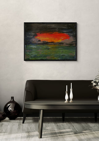 Burning sky by Ian Frederick Harris in a black frame above a dark sofa in a grey living room