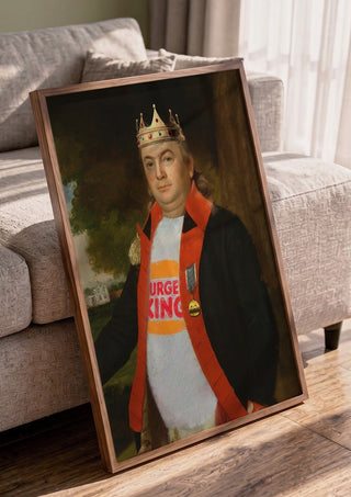 Fast Food King by Dikhotomy in a walnut frame leaning against a grey sofa