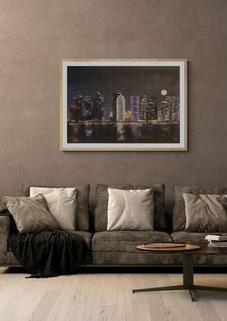 Doha by night by Dina in an oak frame above a grey sofa with cushions