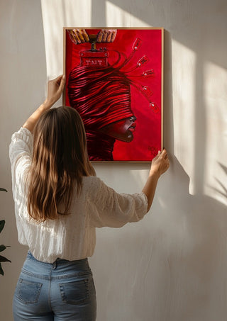 TNT by Ronny Simon being hung on a sunlit wall