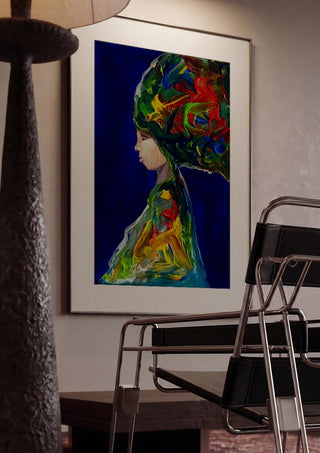 The Wind by Ronny Simon framed in a dim room beside a tubular steel chair