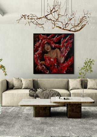 The Party by Ronny Simon in a black frame above a beige sofa under a branch chandelier