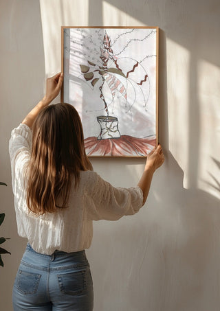 Earth Fairy by A Sleepy Spirit Art being hung on a sunlit wall