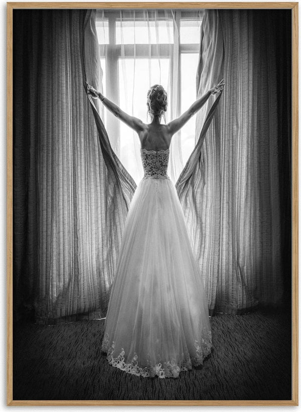 A woman in an elegant gown stands before a window, holding open curtains; cover of Girl in Paris by Boris Hristov.