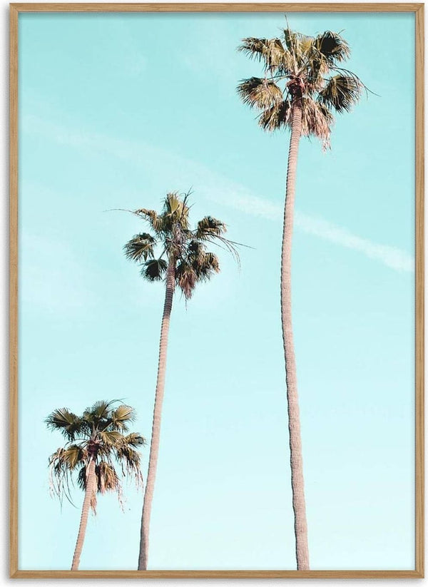 Three tall palm trees against a clear blue sky on the Tall Palms on Beach Plakat product page.