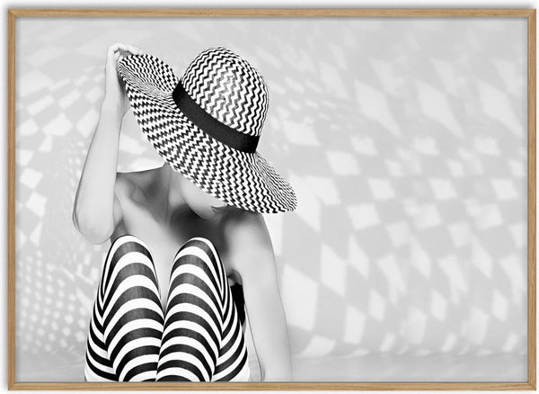 Black and white Zig the Zag poster showing a person in striped leggings and a large zigzag-patterned hat.